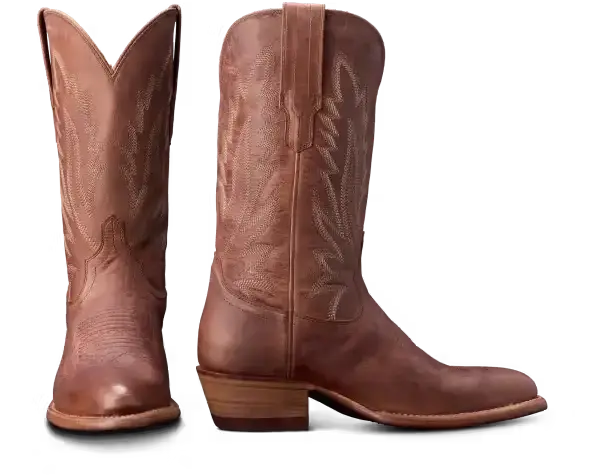A pair of brown leather Tecova cowboy boots.